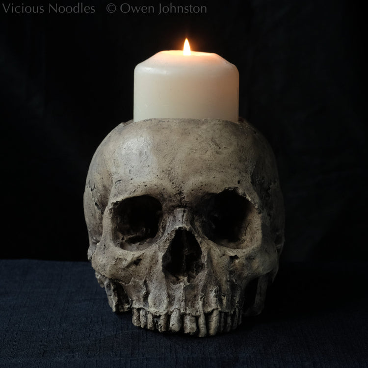 Human skull candle holders