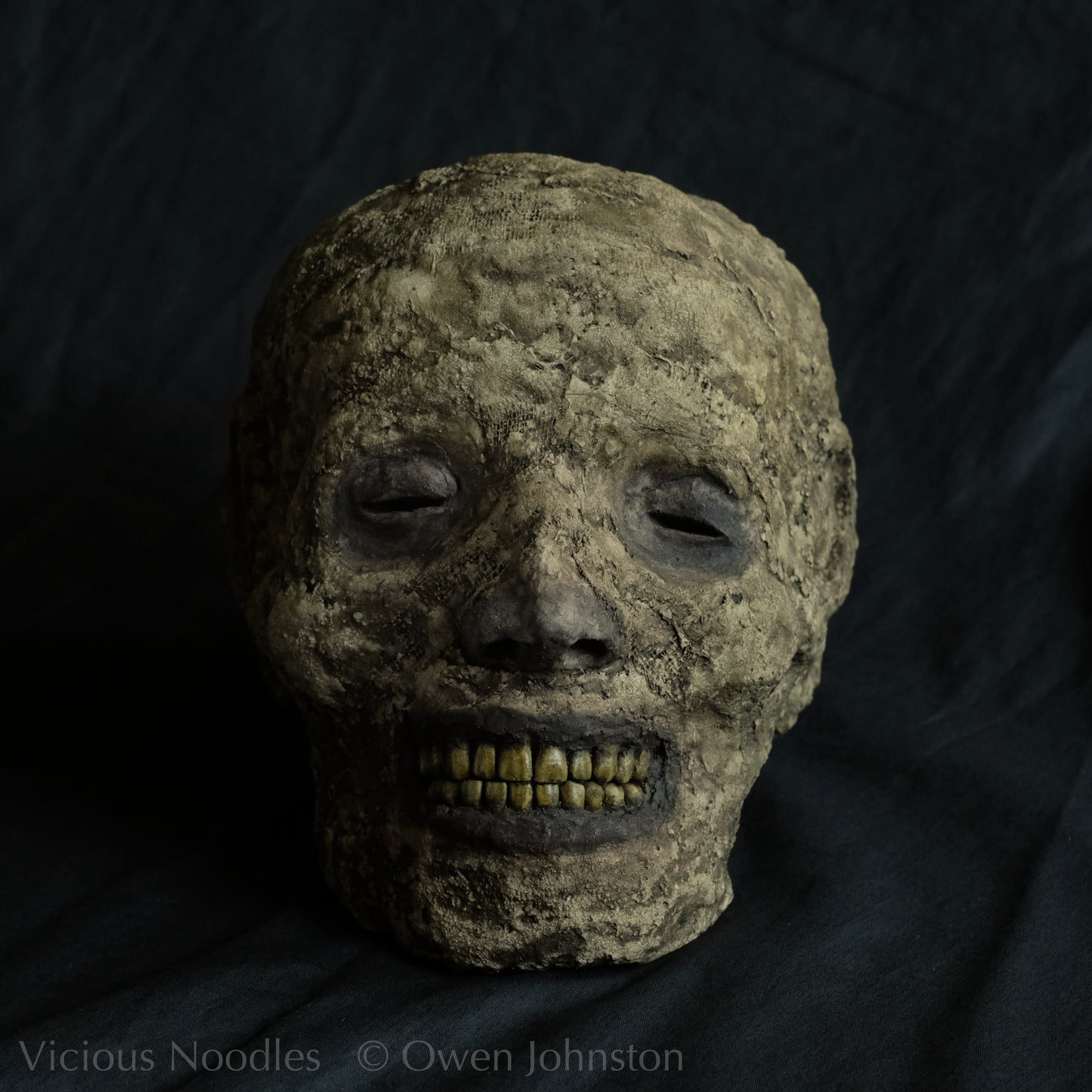 Replica mummified head