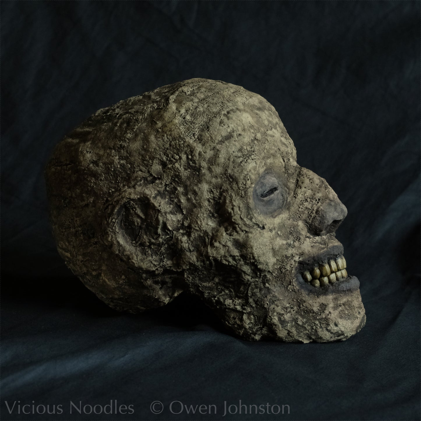 Replica mummified head