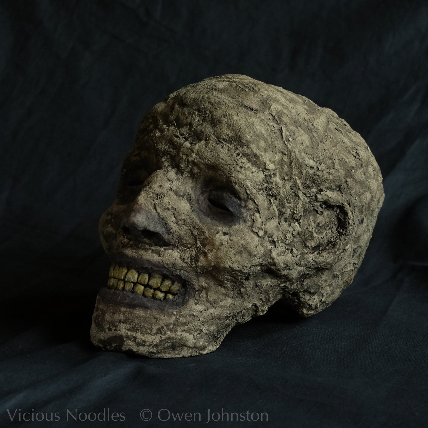 Replica mummified head