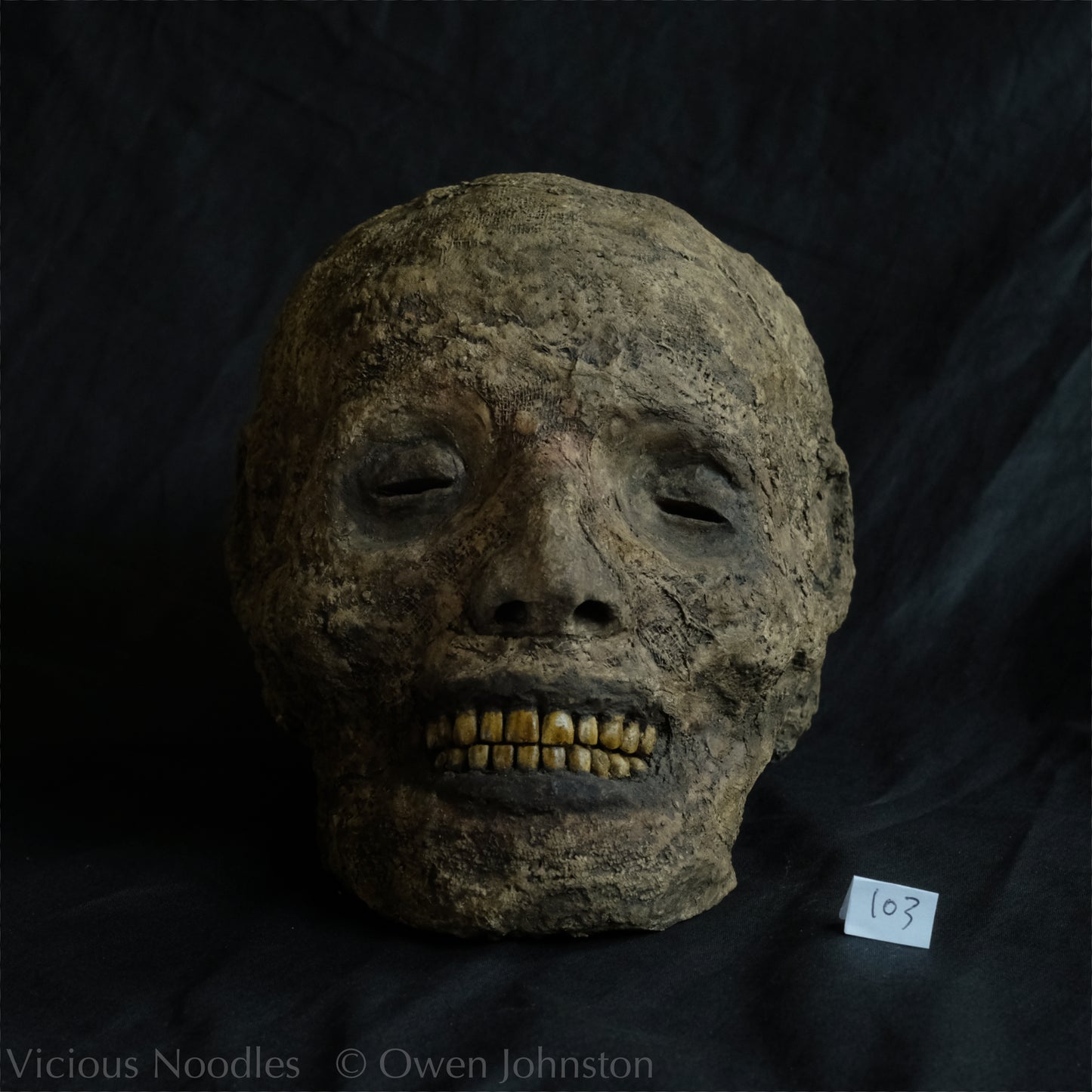 Replica mummified head