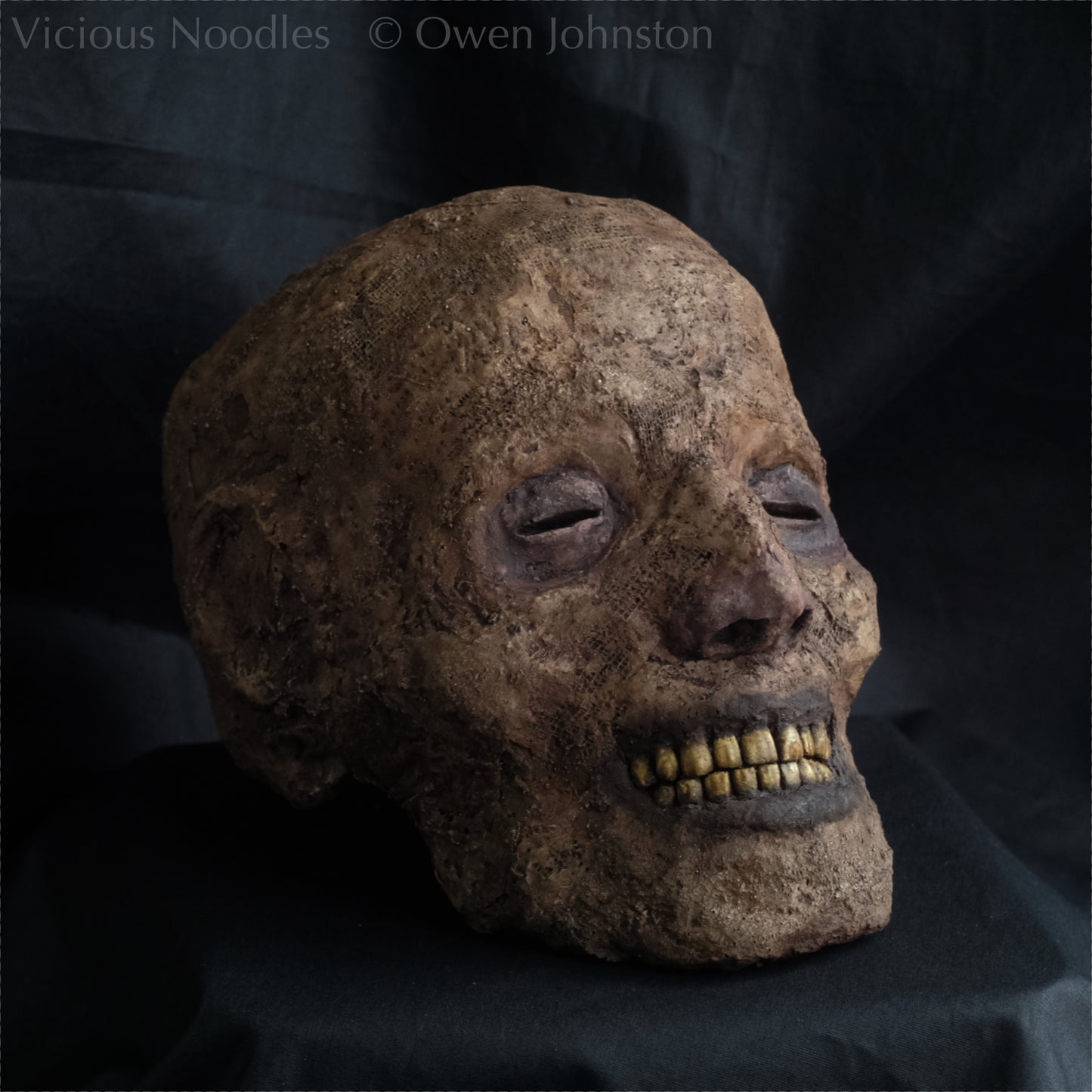 Replica mummified head