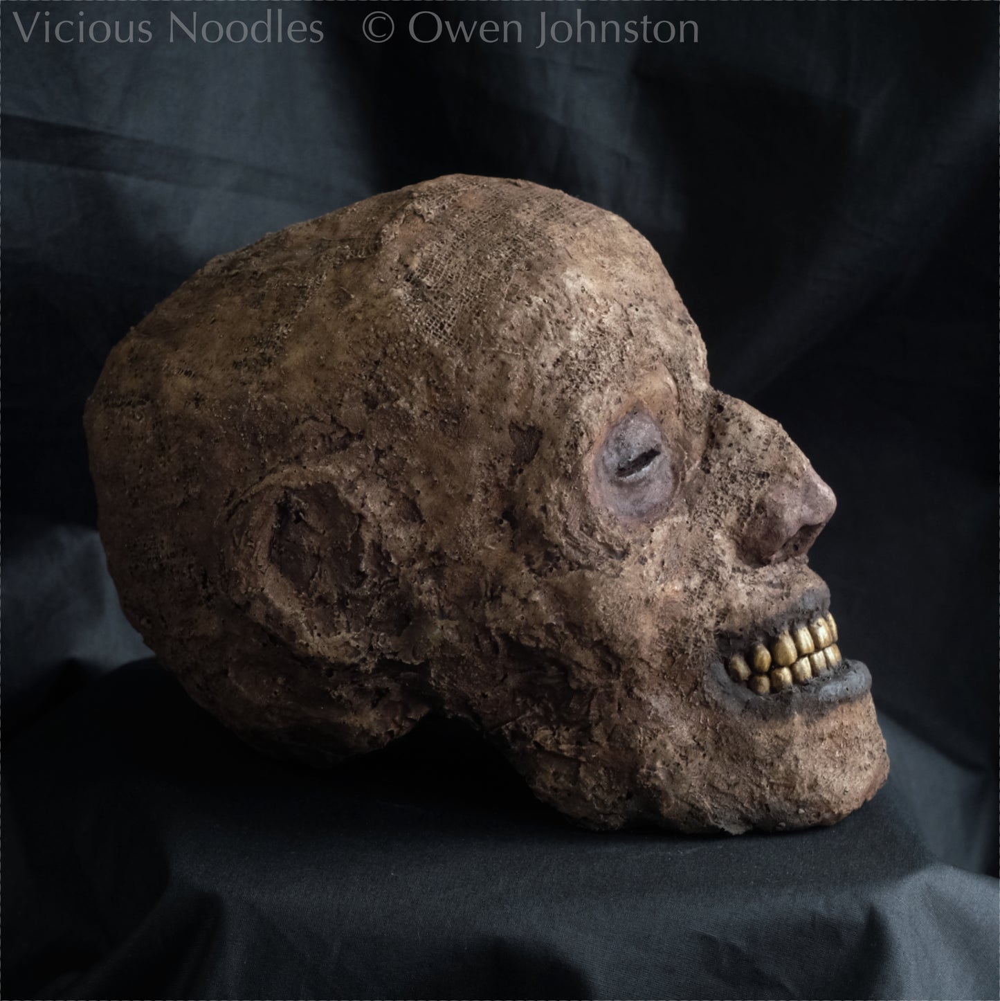 Replica mummified head