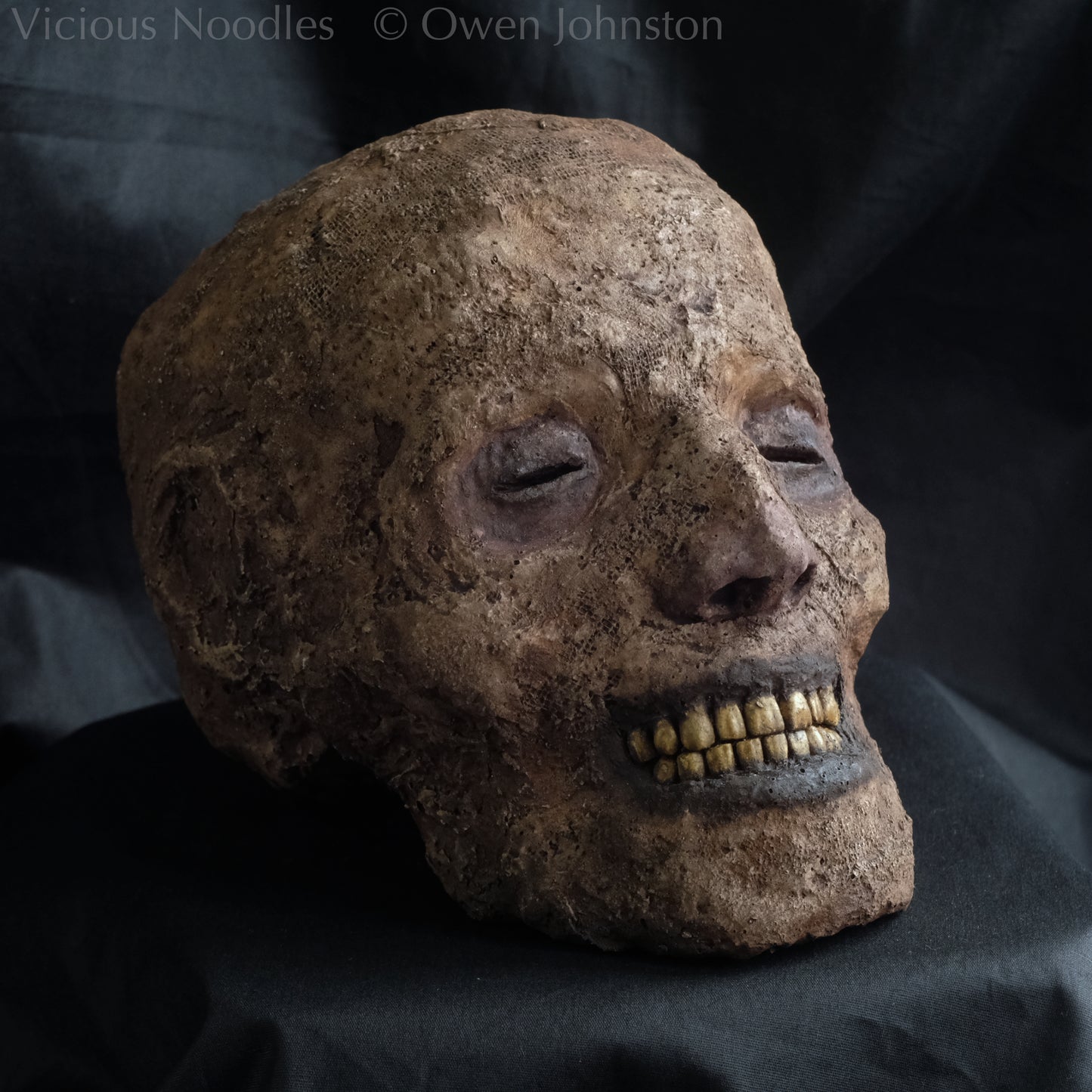 Replica mummified head