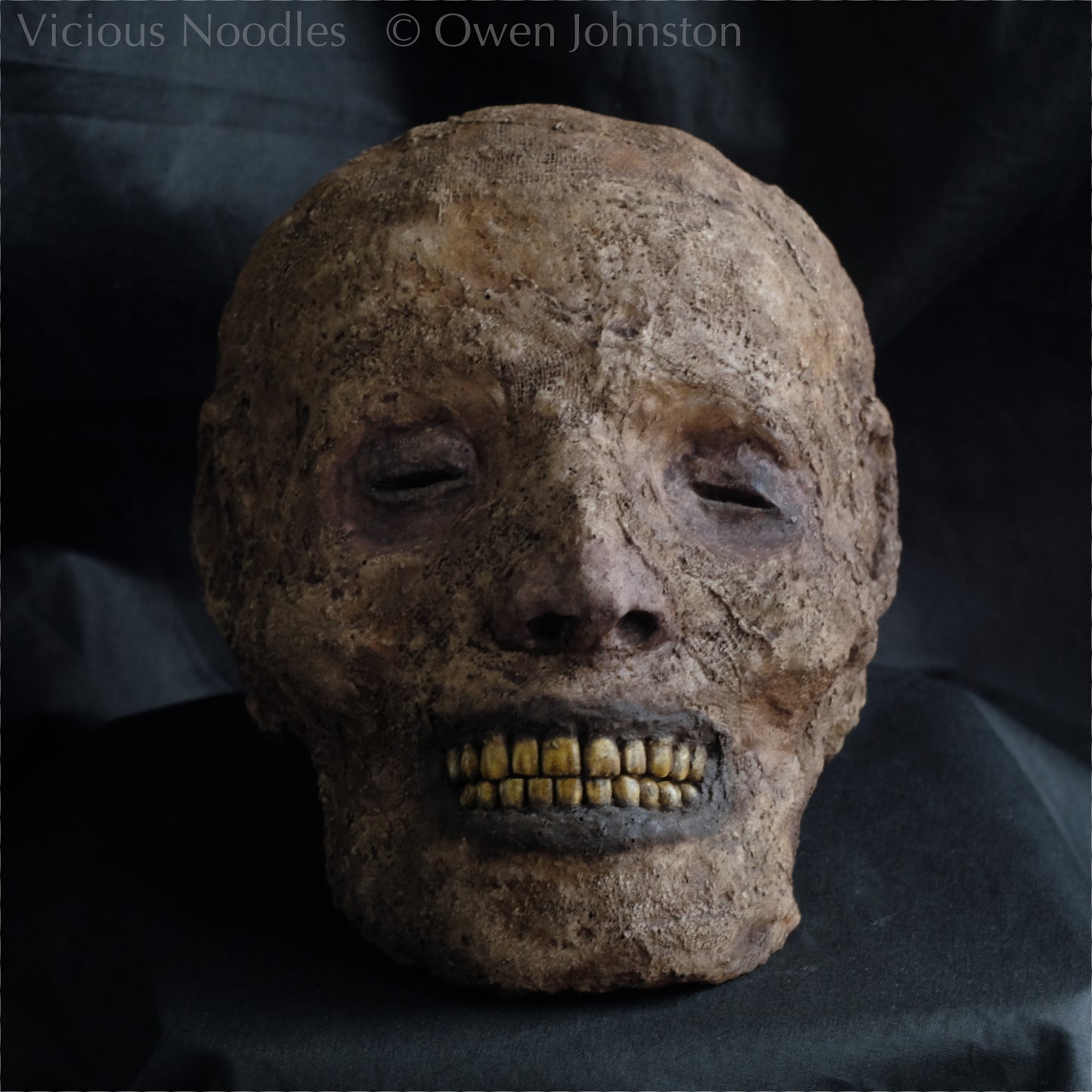 Replica mummified head