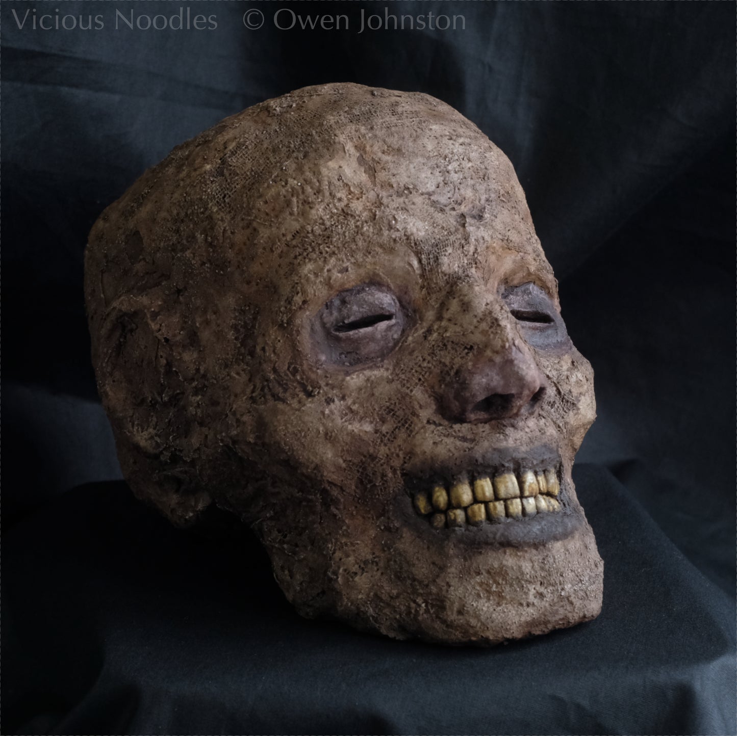 Replica mummified head