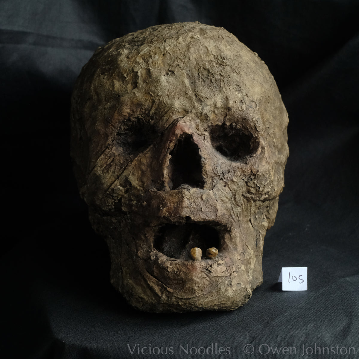 Replica mummified head