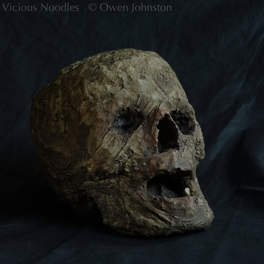 Replica mummified head