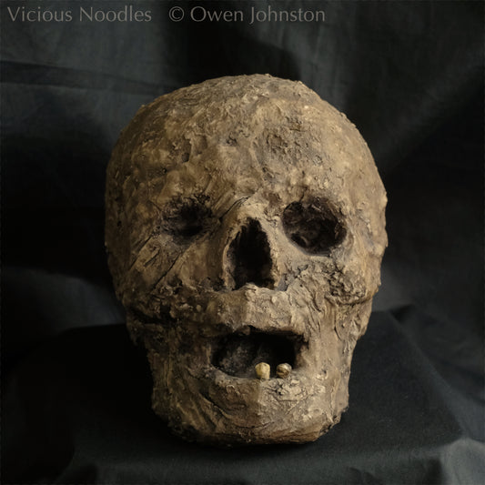 Replica mummified head