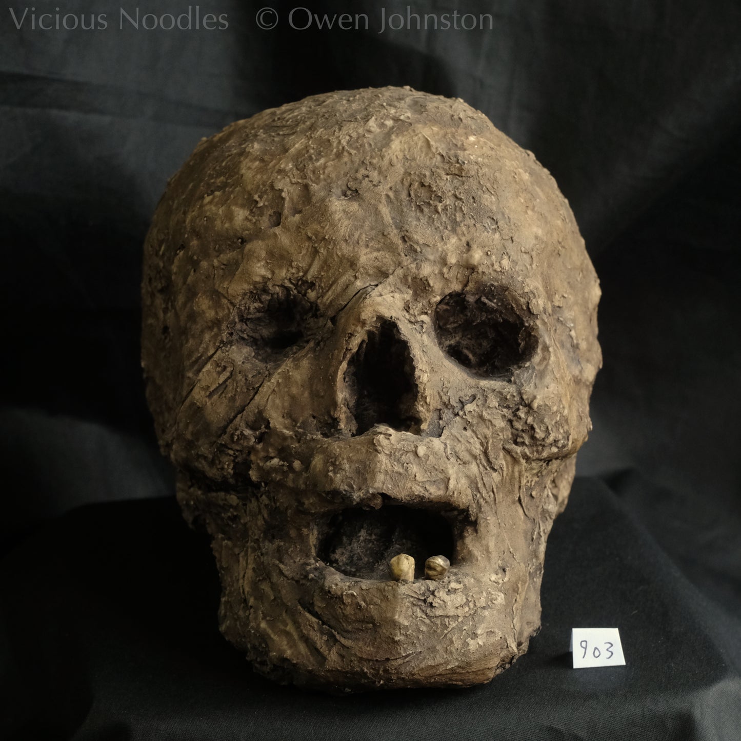 Replica mummified head