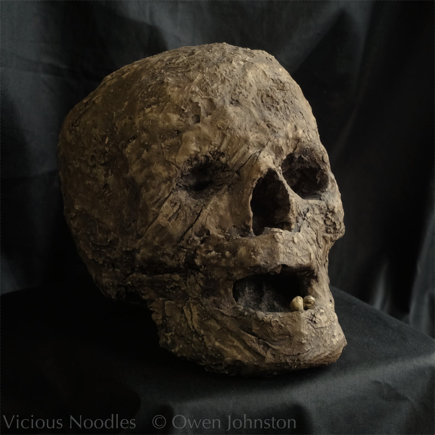 Replica mummified head