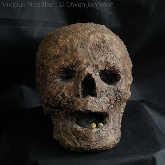 Replica mummified head