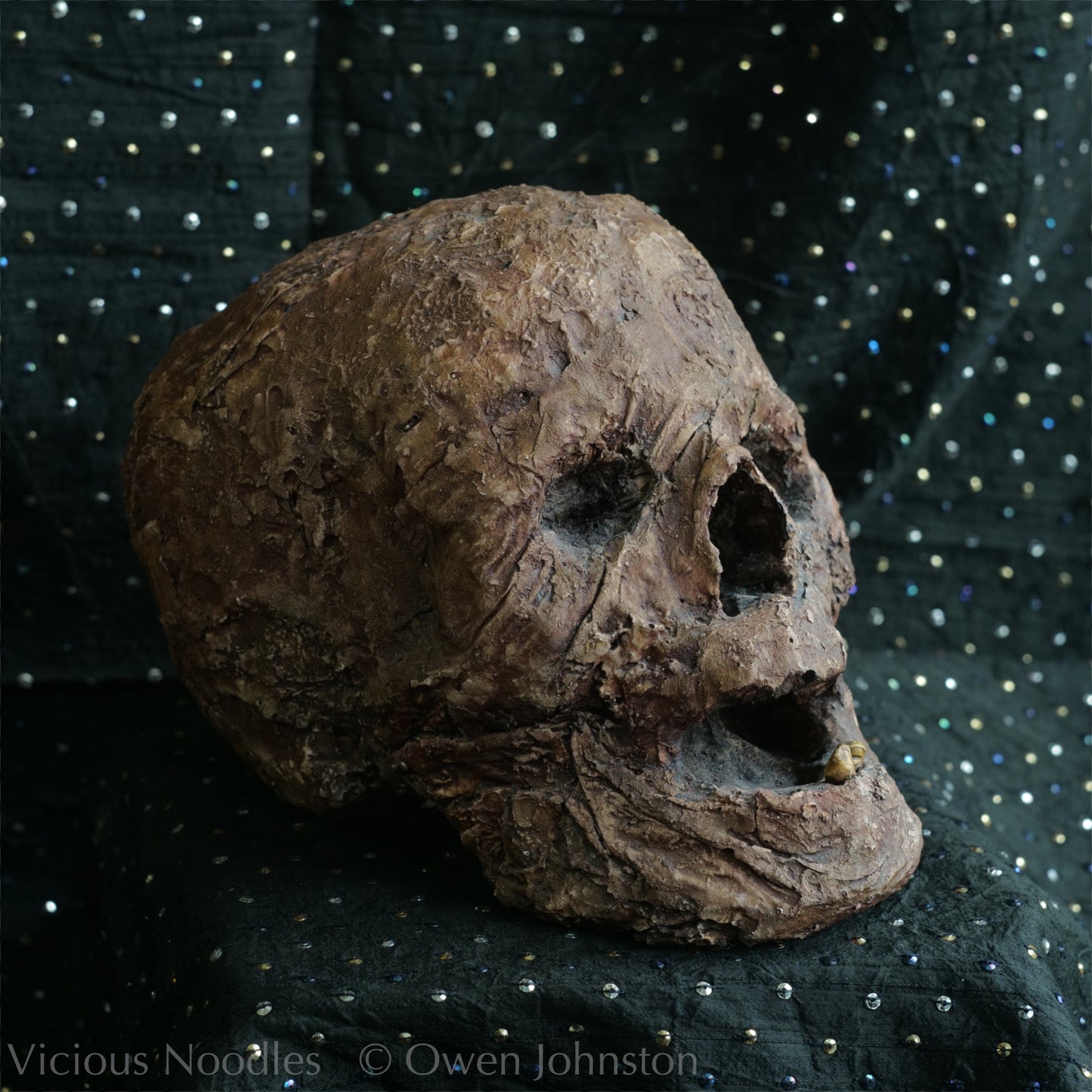 Replica mummified head
