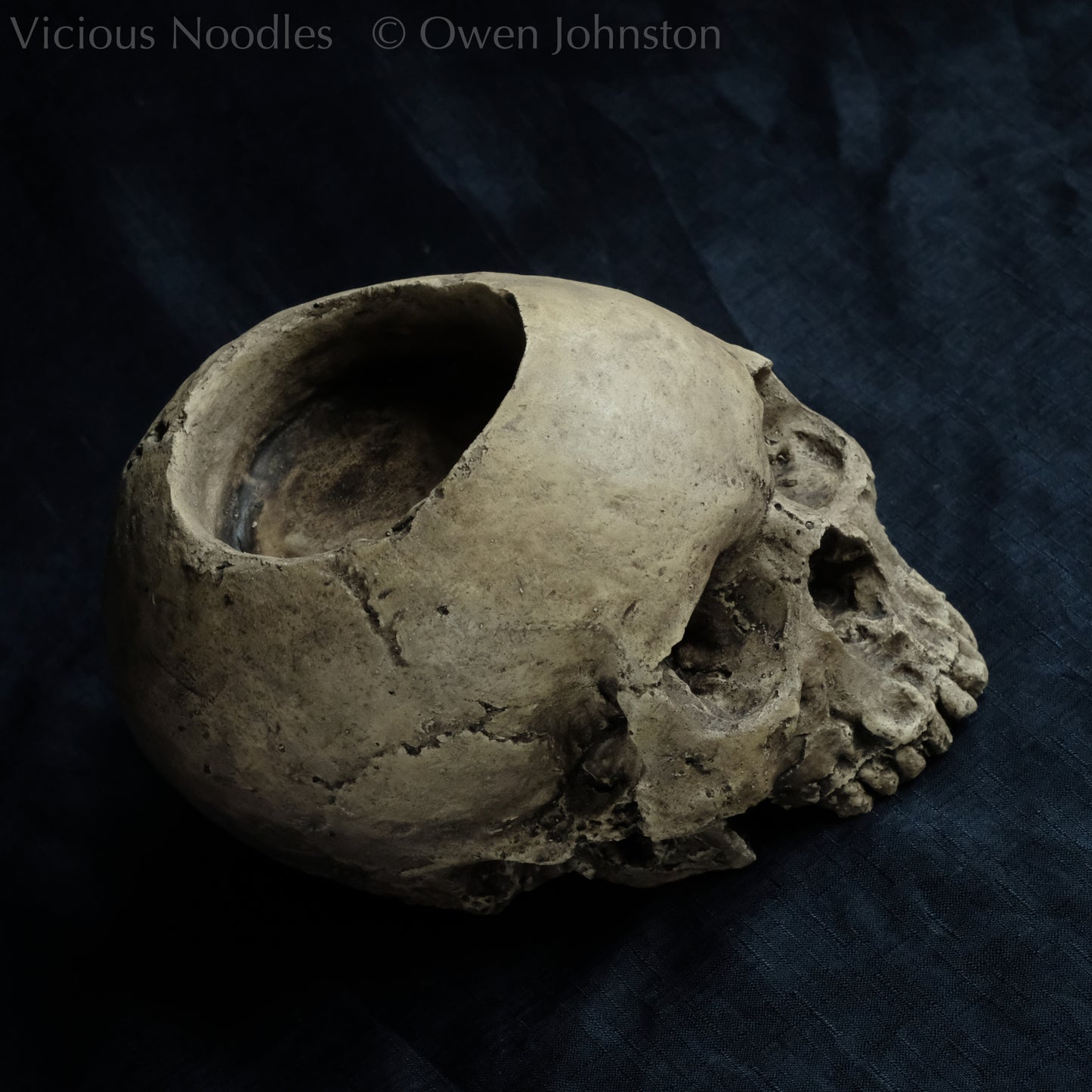 Human skull candle holder, natural weathered finish