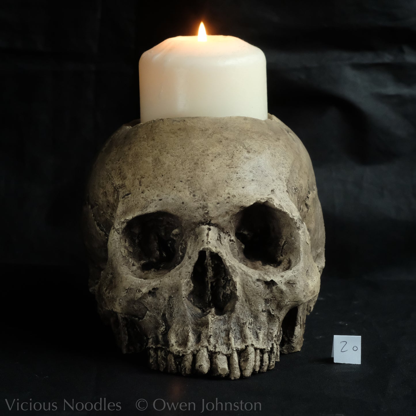 Human skull candle holder, natural weathered finish