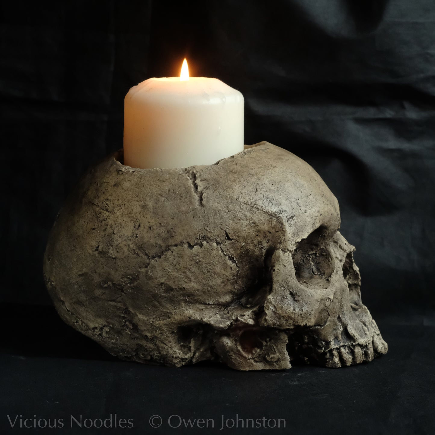 Human skull candle holder, natural weathered finish