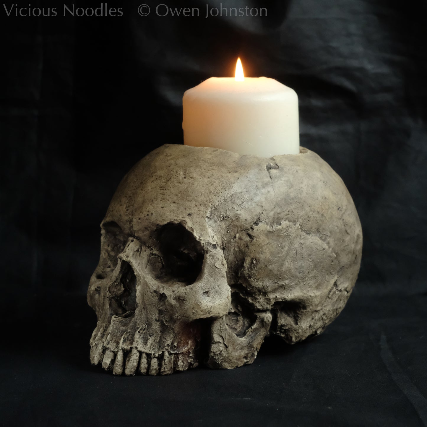 Human skull candle holder, natural weathered finish