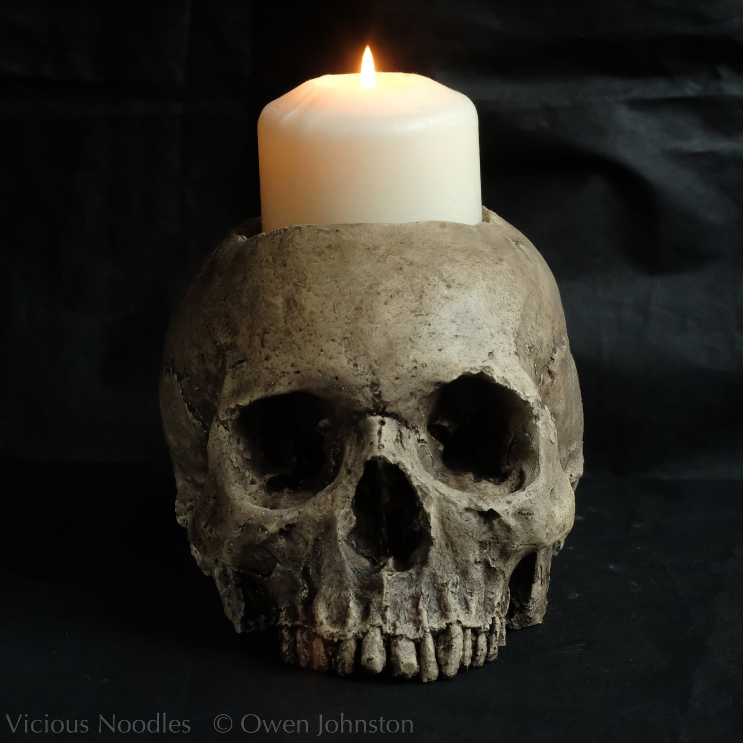 Human skull candle holder, natural weathered finish