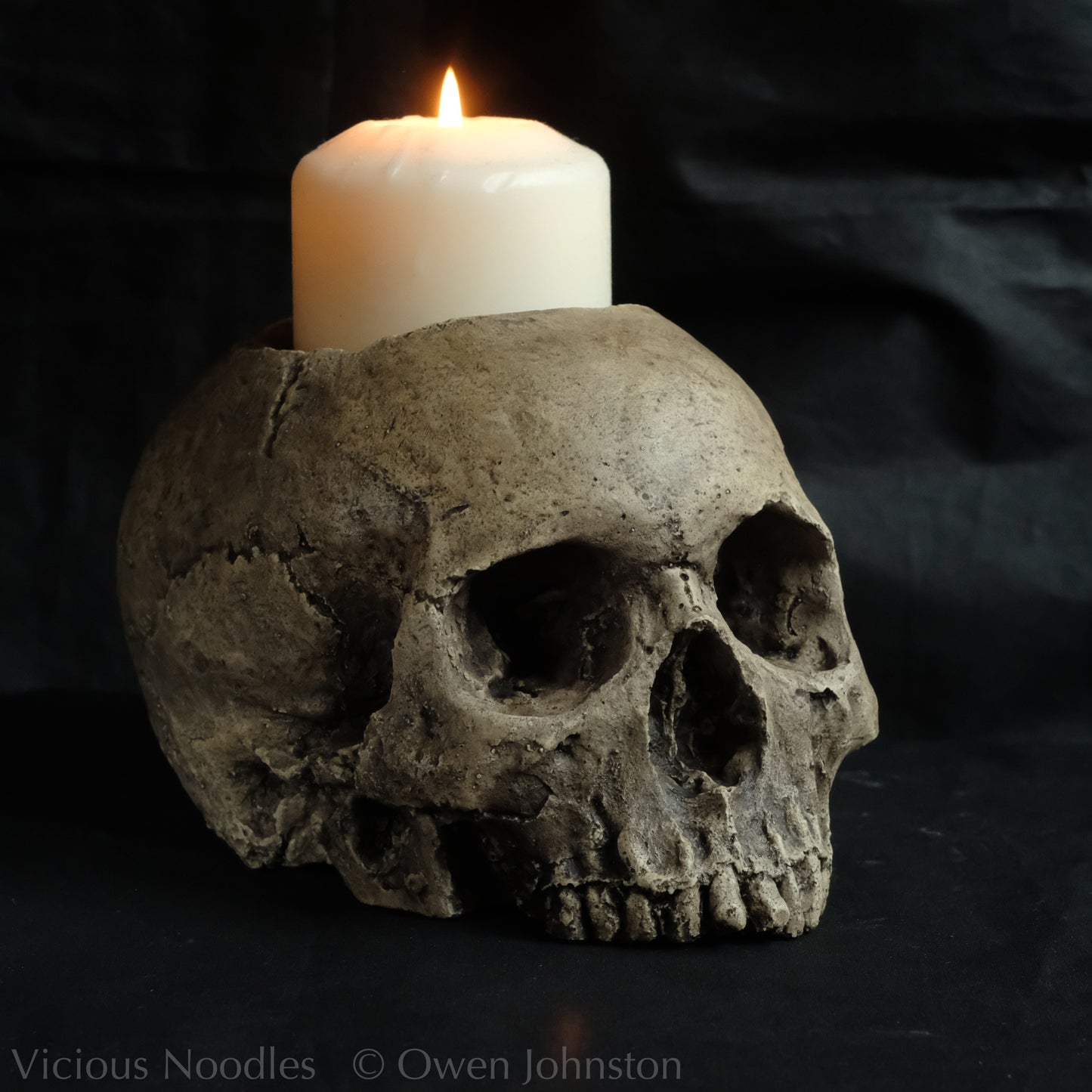 Human skull candle holder, natural weathered finish