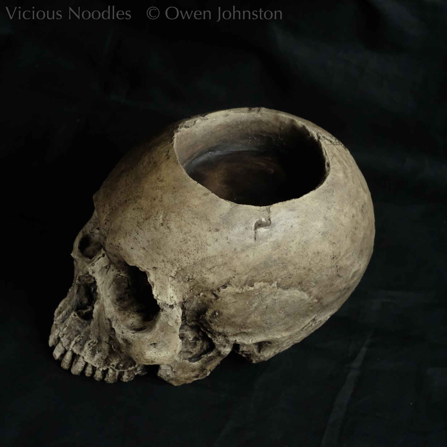 Human skull candle holder, natural weathered finish