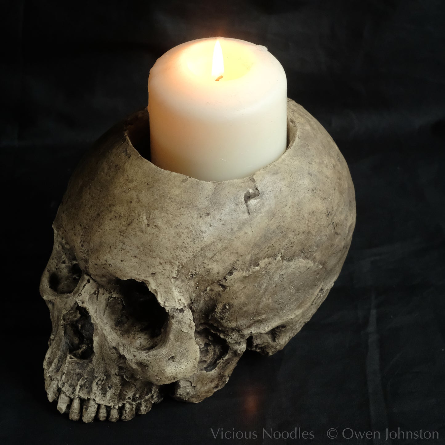 Human skull candle holder, natural weathered finish