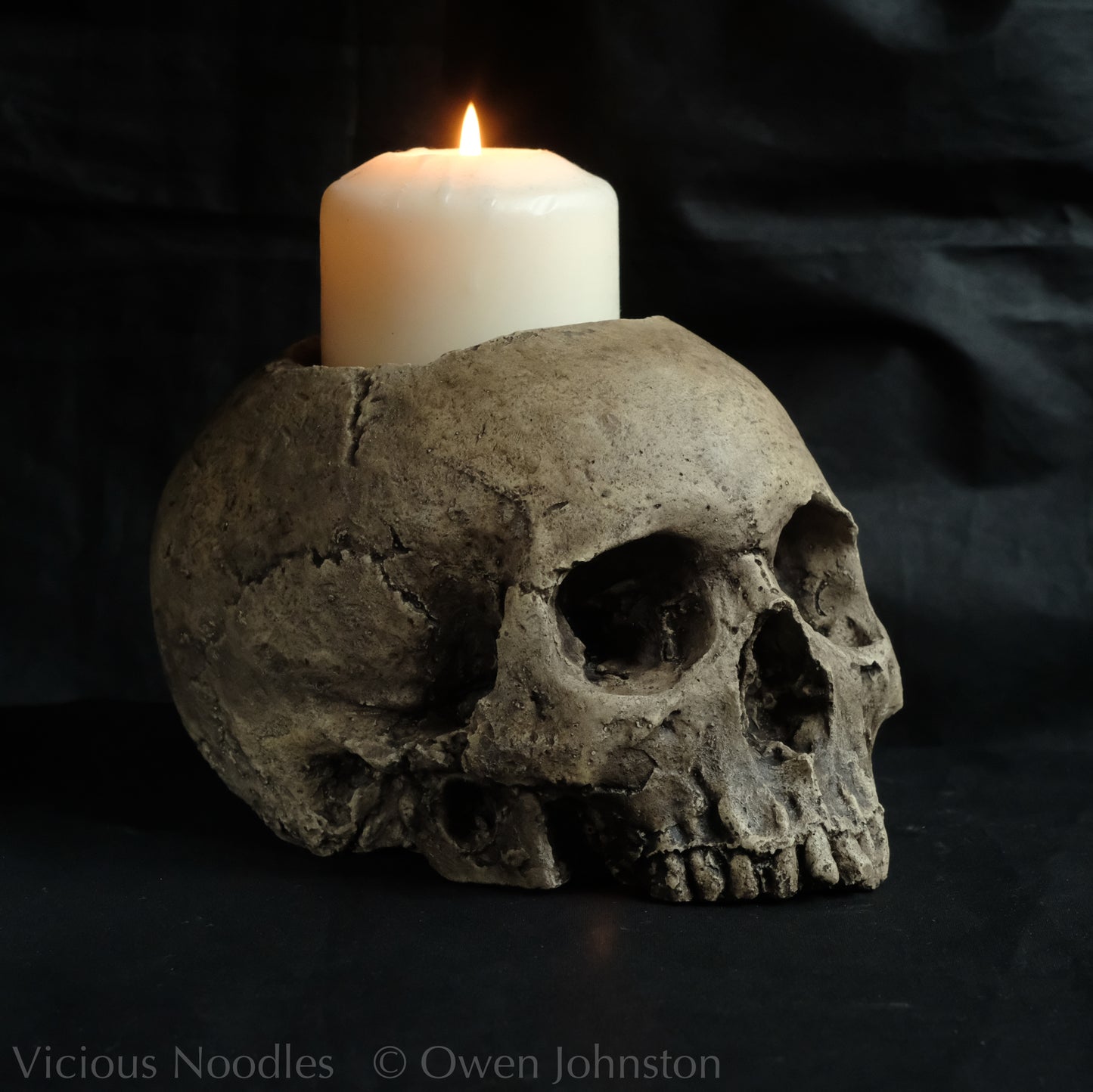 Human skull candle holder, natural weathered finish