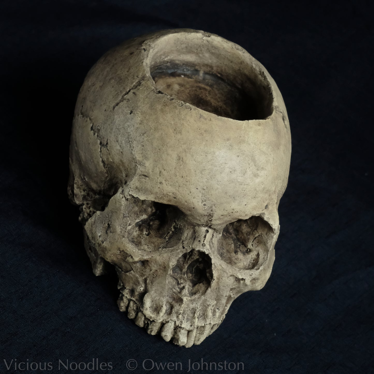 Human skull candle holder, natural weathered finish
