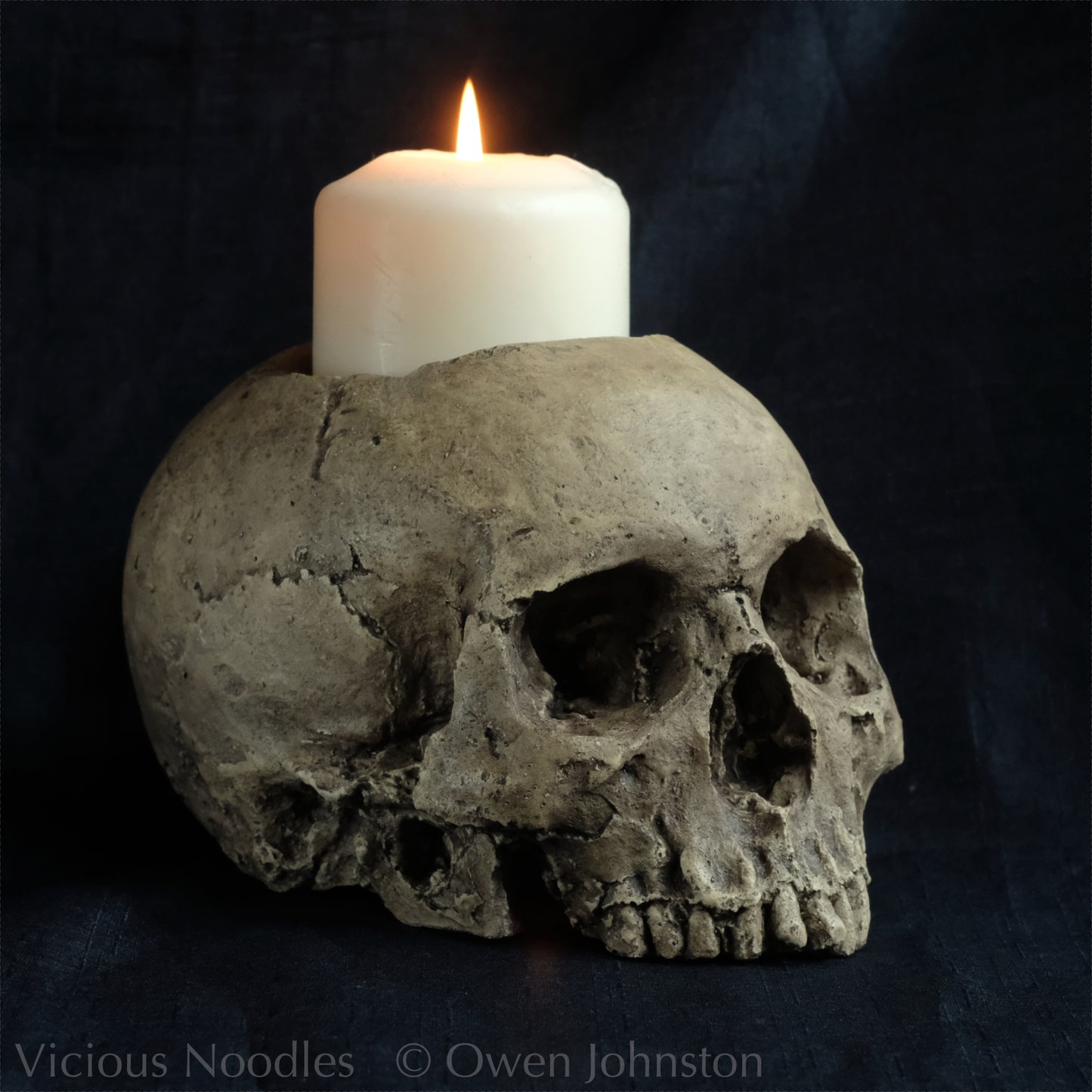Human skull candle holder, natural weathered finish