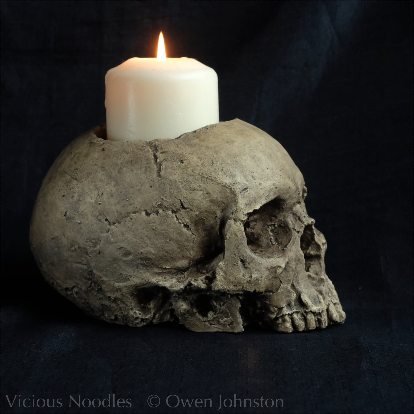 Human skull candle holder, natural weathered finish