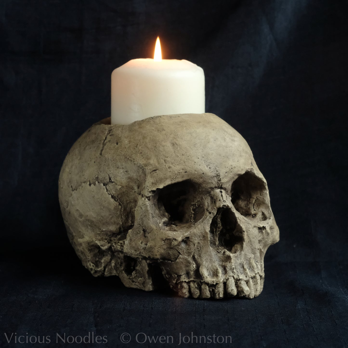 Human skull candle holder, natural weathered finish
