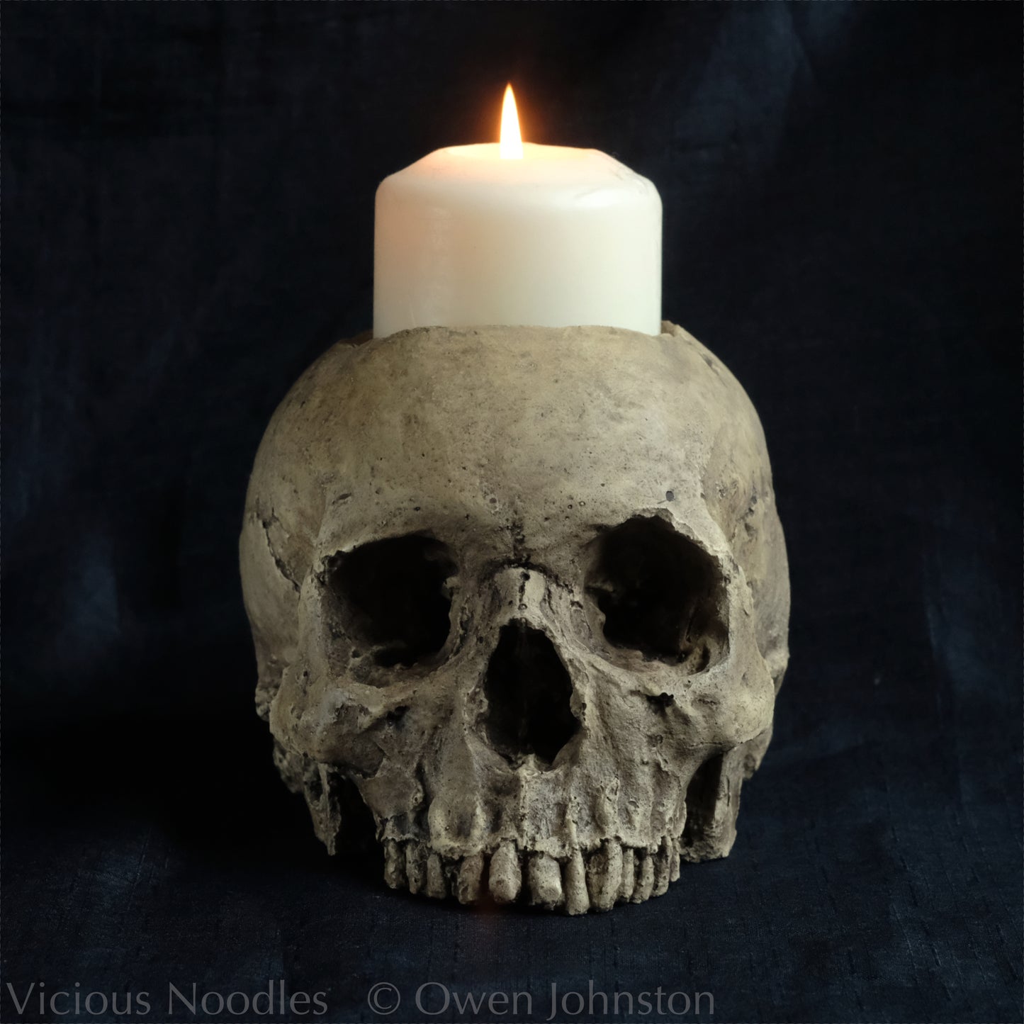 Human skull candle holder, natural weathered finish
