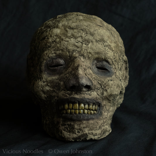 Replica mummified head