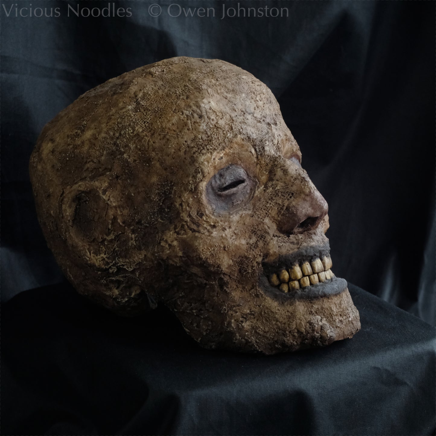 Replica mummified head