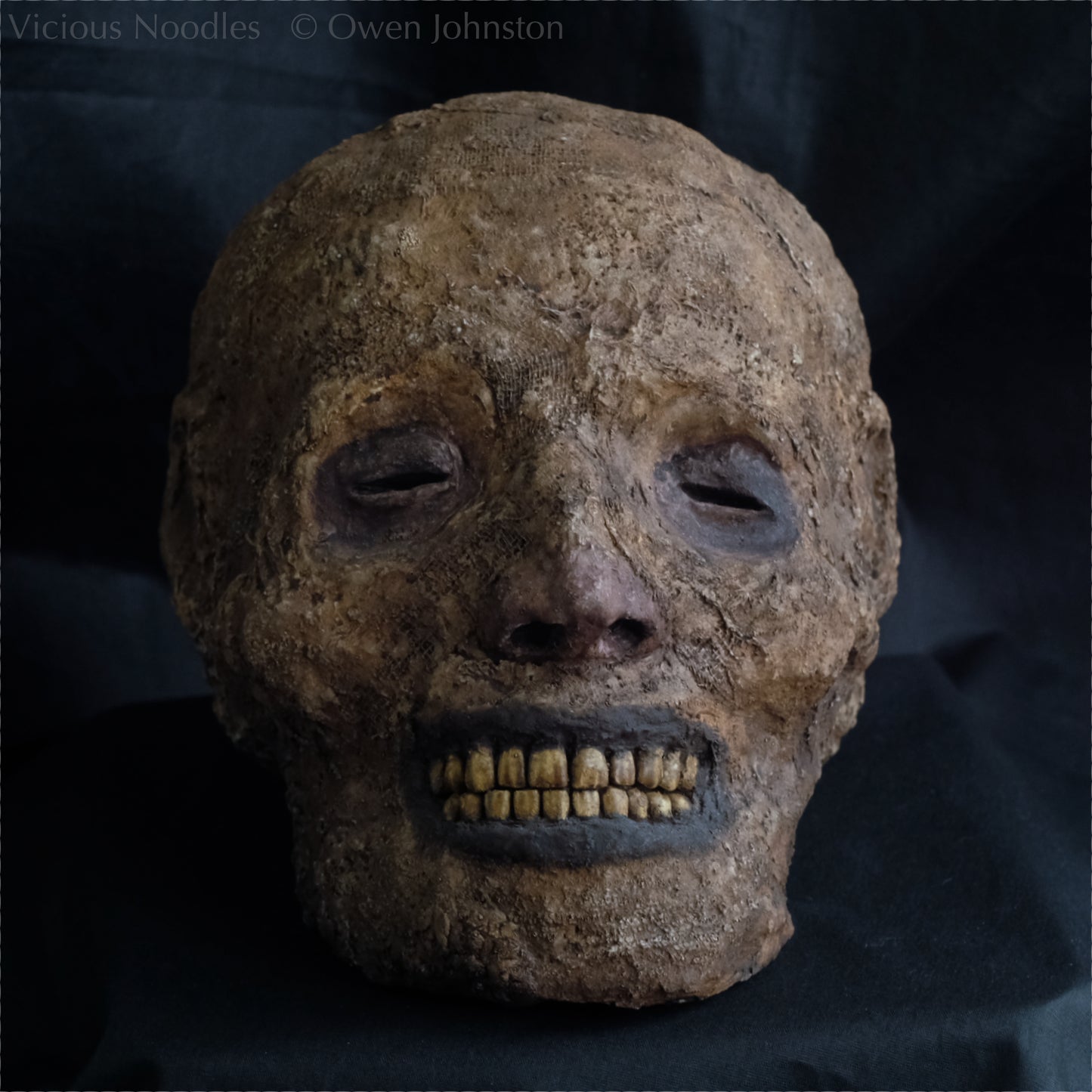 Replica mummified head