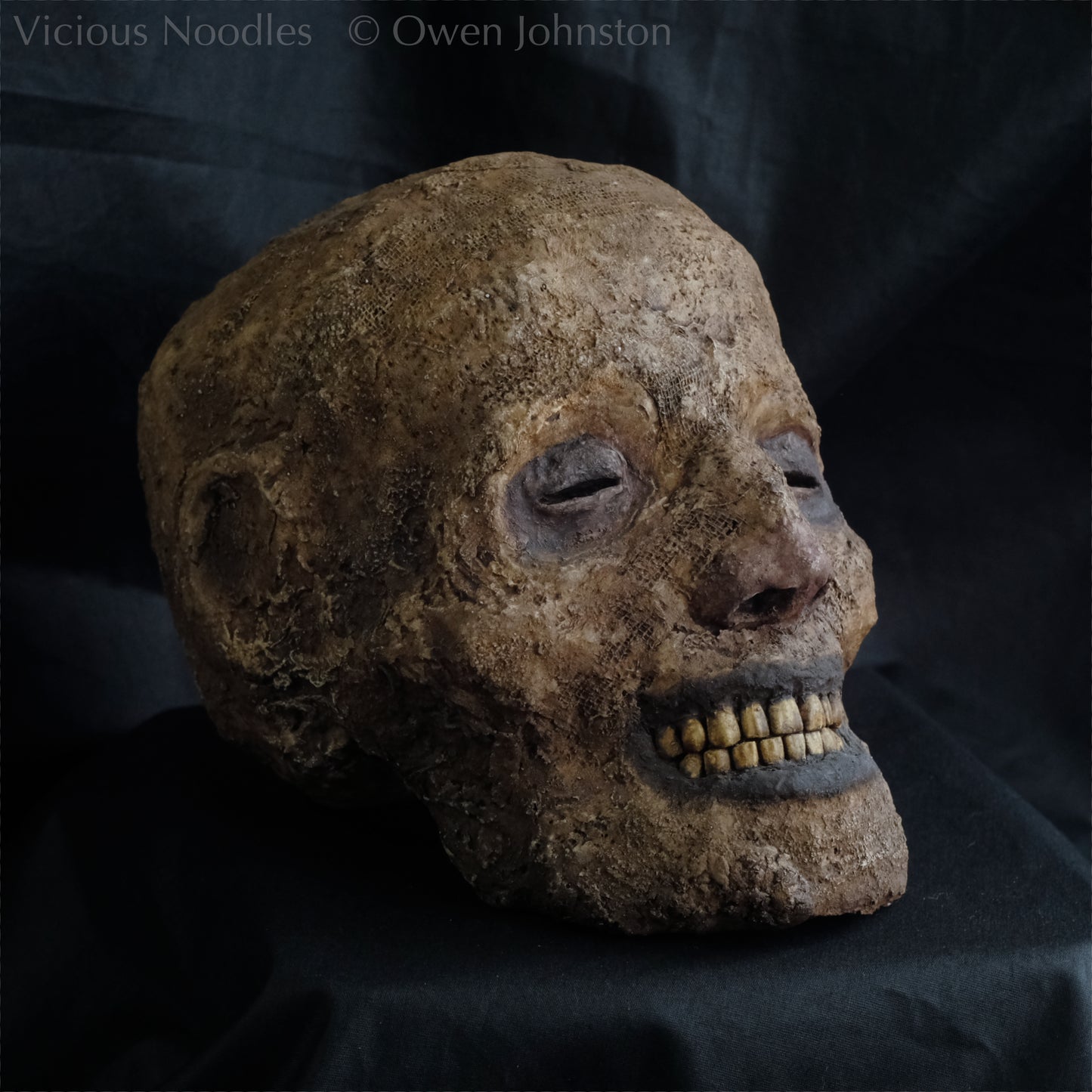 Replica mummified head