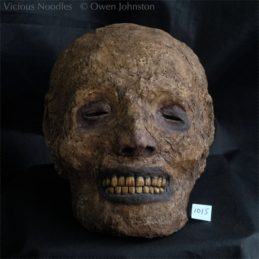 Replica mummified head
