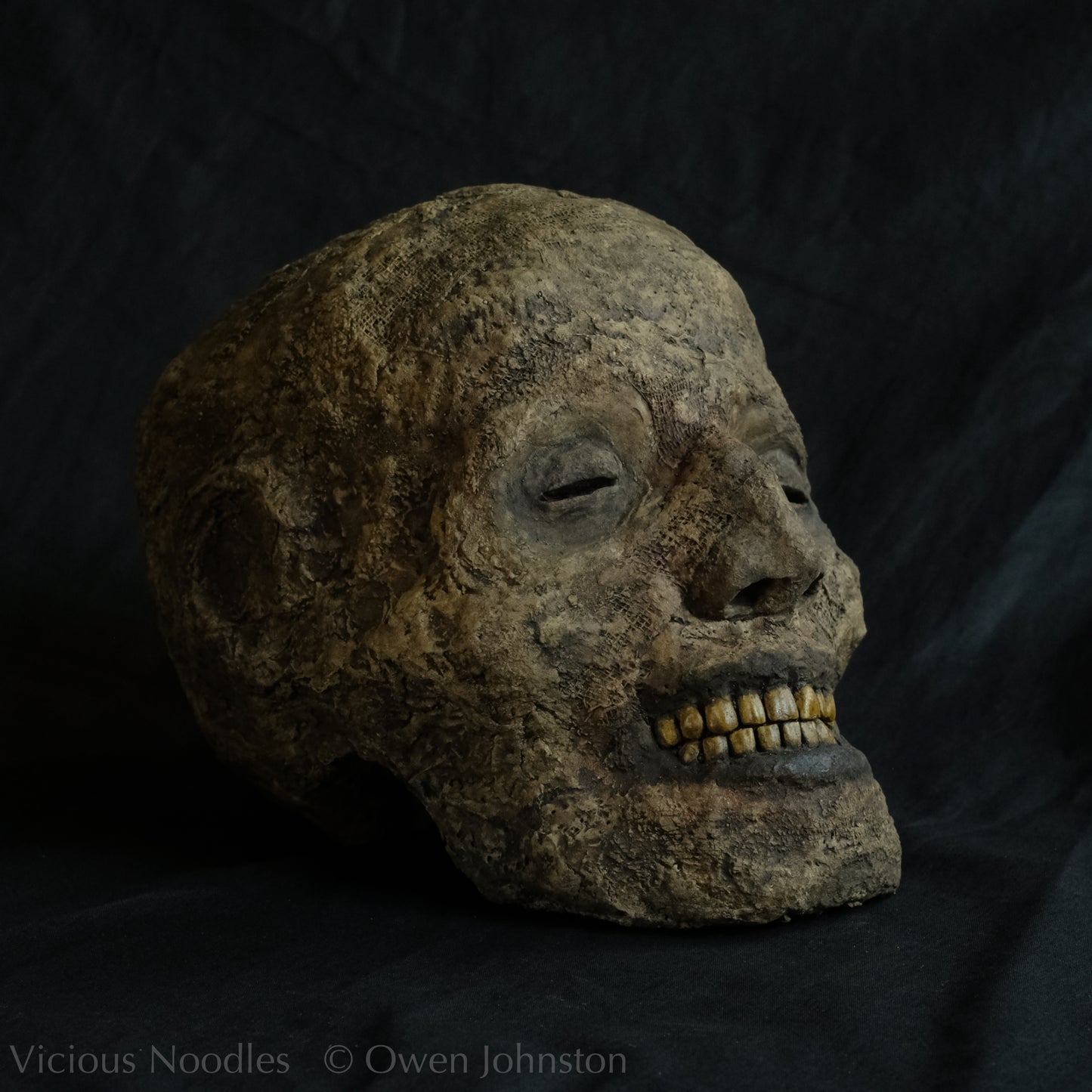 Replica mummified head
