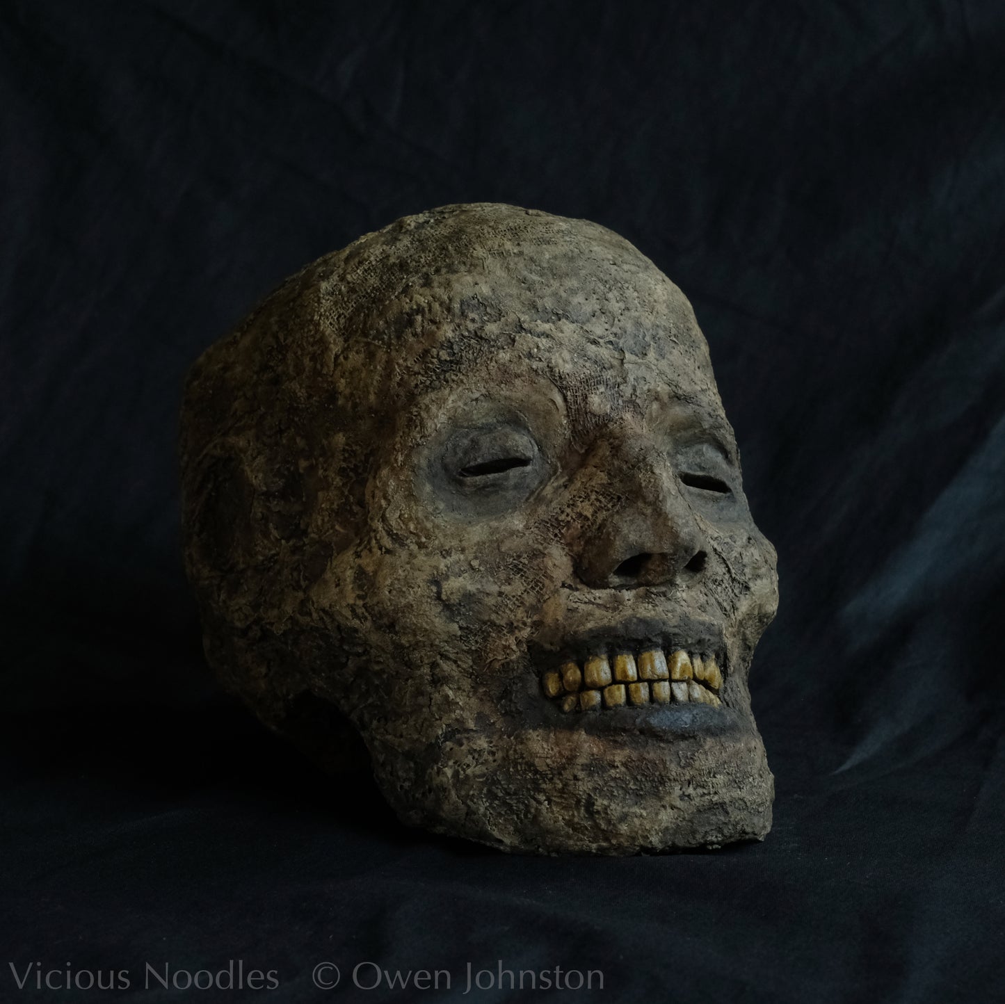Replica mummified head