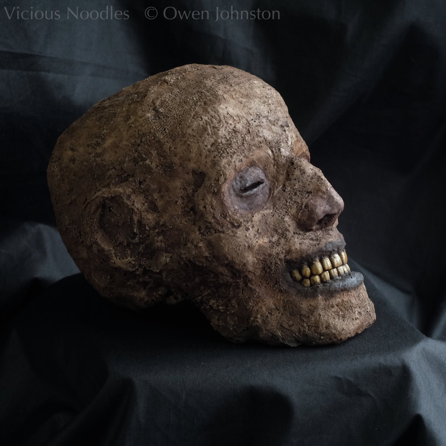 Replica mummified head