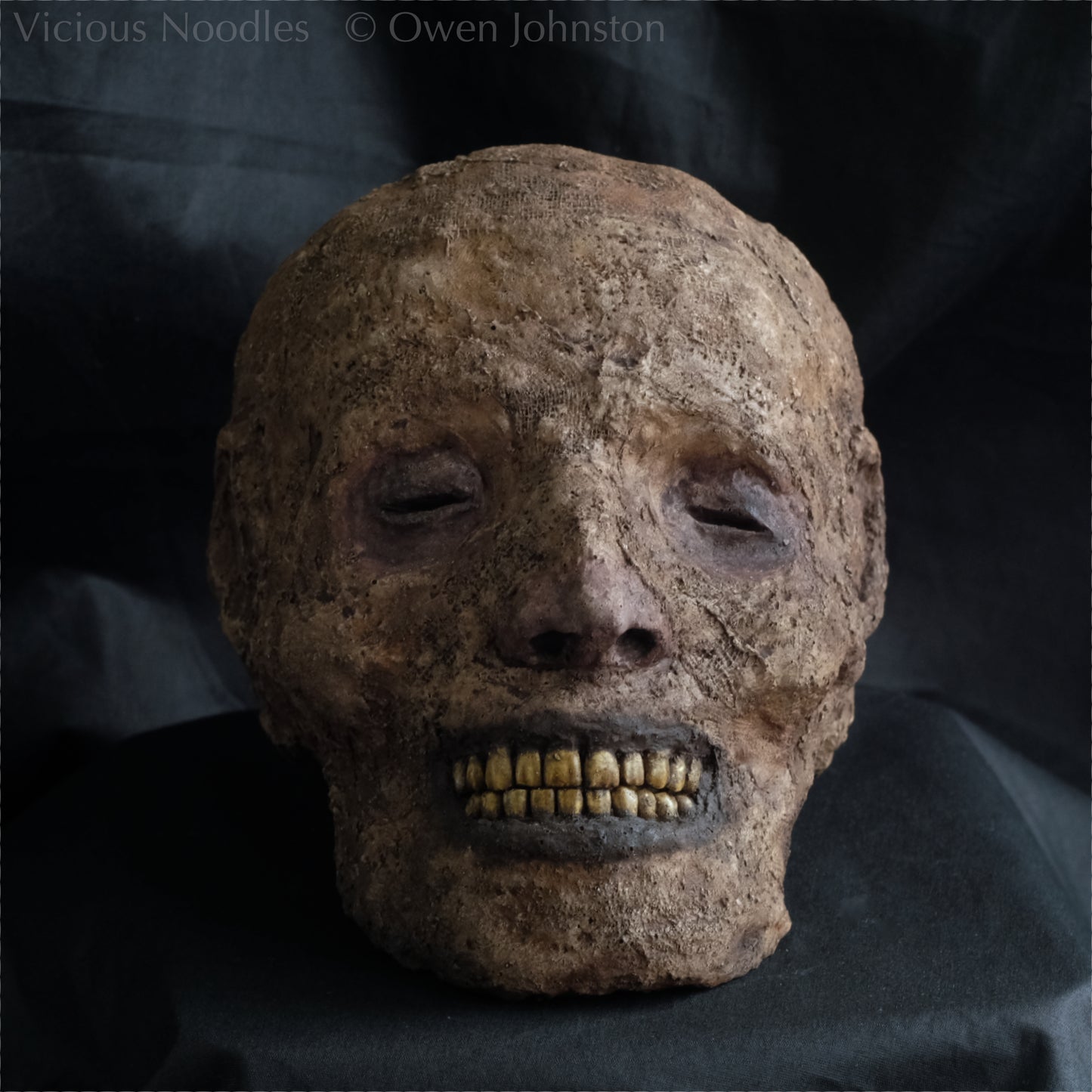Replica mummified head