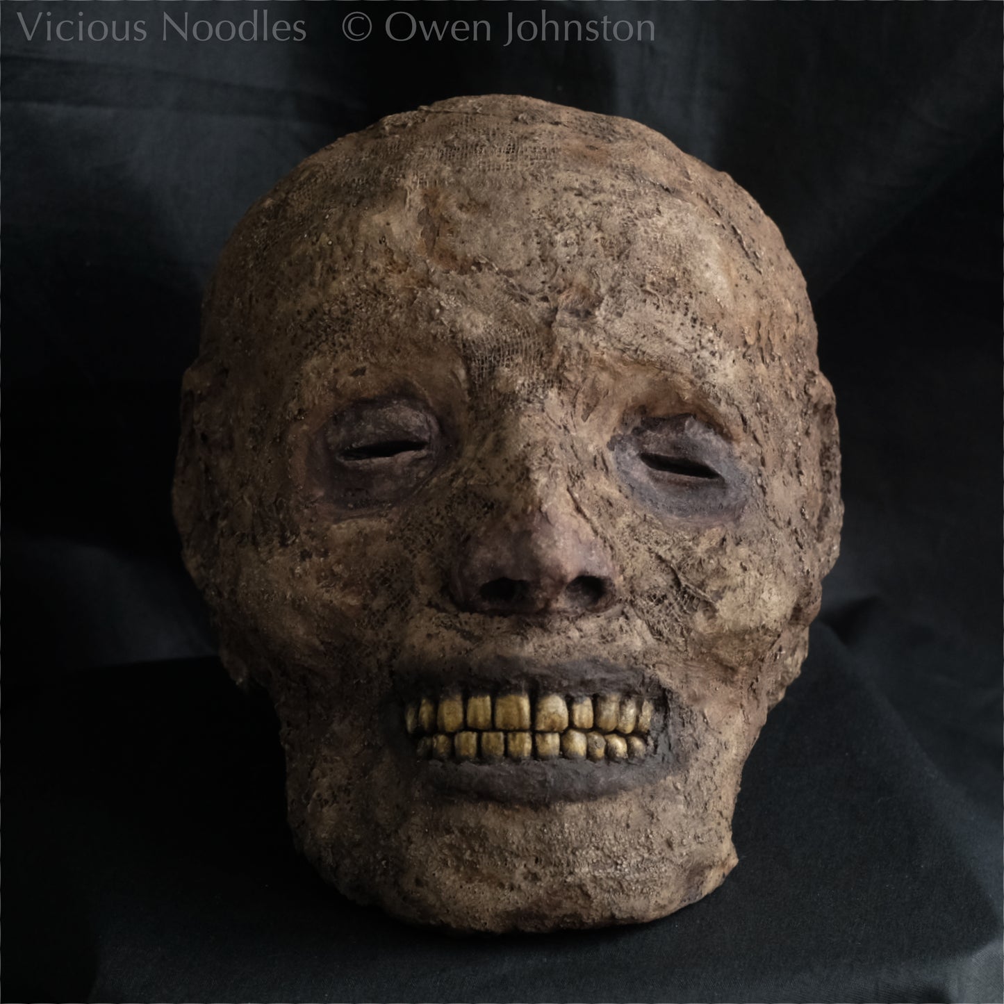 Replica mummified head