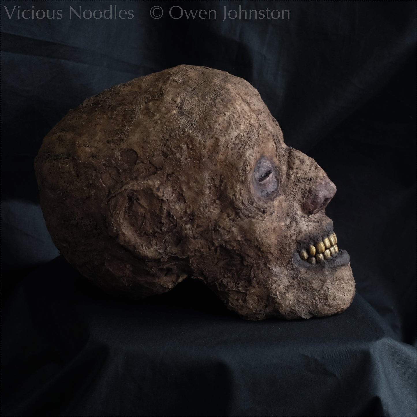 Replica mummified head